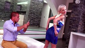 A blonde with a nice tight body is on her knees, giving a blow job