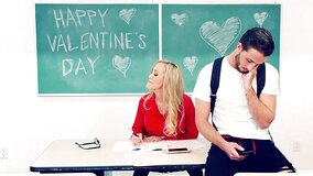 A blonde with large tits is fucked in the classroom hard